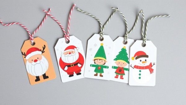 Whimsical customizable Christmas gift tag layouts with festive characters.