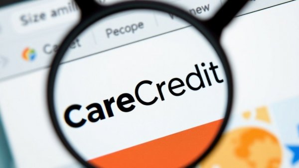 Magnified view of CareCredit logo on website, highlighting text.