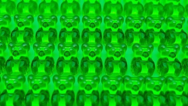 Green bear gummies pattern showcasing greens gummies nutrition.