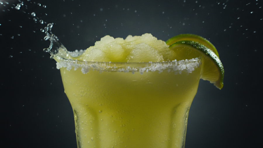 Vibrant yellow-green margarita showcasing summer drink specials, perfect for Kansas City dining deals.