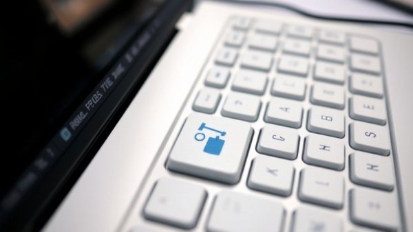 Auction key on keyboard symbolizes high auction prices.