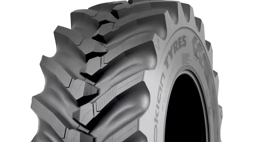 Nokian Tyres Soil King VF tractor tire with blue wheel hub on concrete.