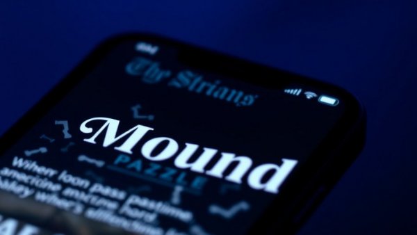 NYT Strands Puzzle on smartphone screen with 'American pastime' theme.
