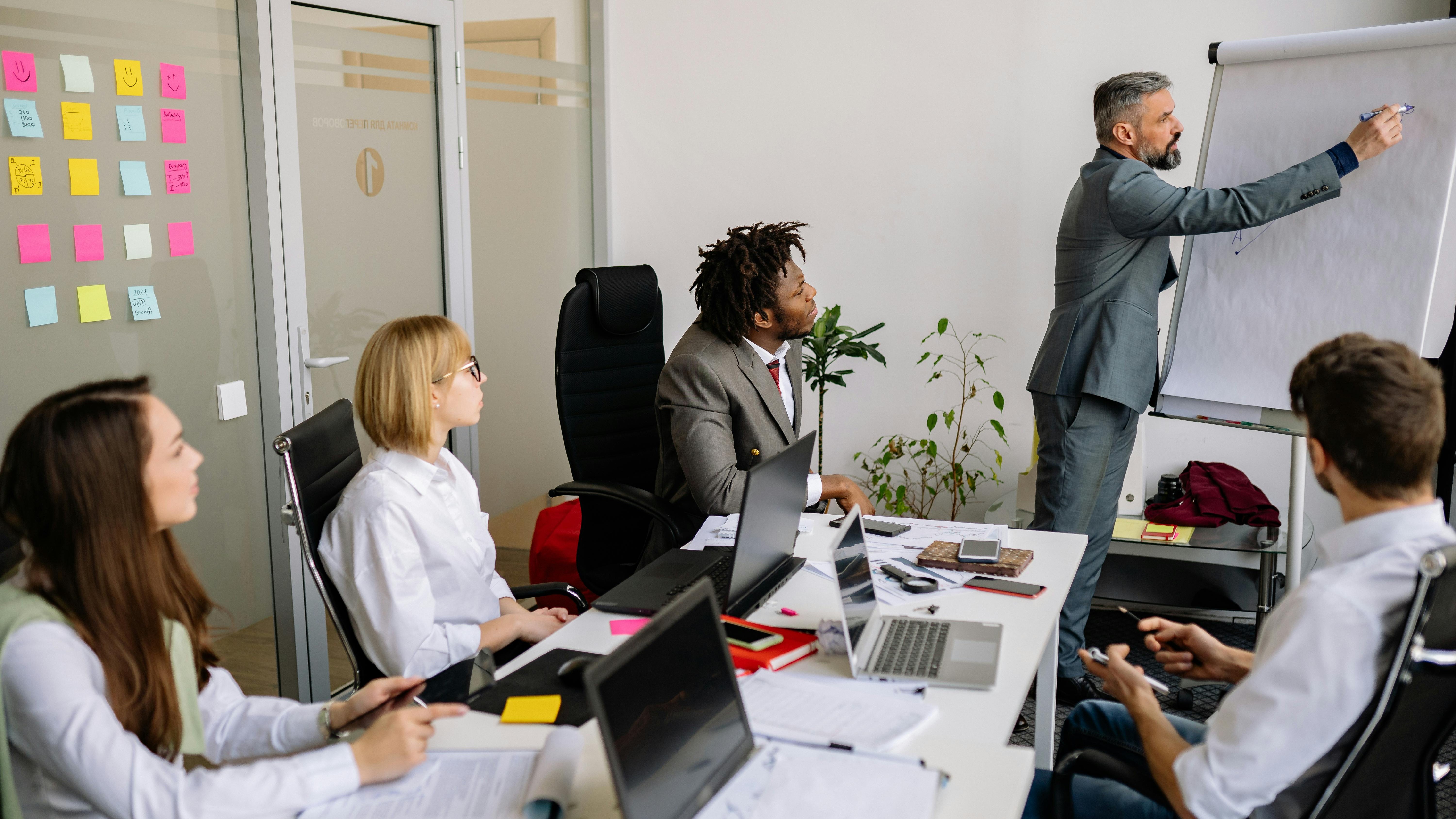 Close-up of fuel gauge with quote about efficiency and humanity.