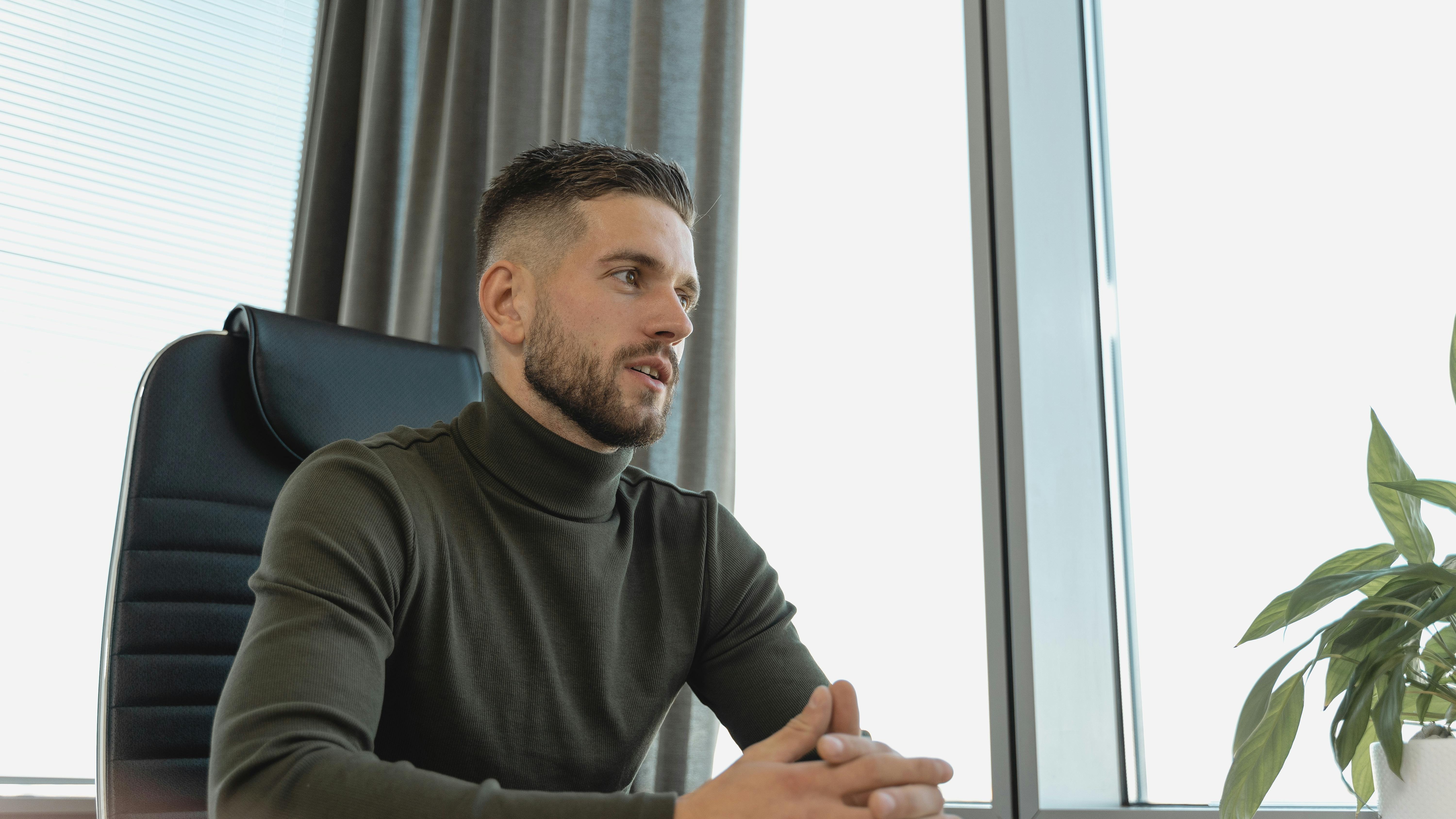 Text graphic on business strategy with company branding and gradient background.