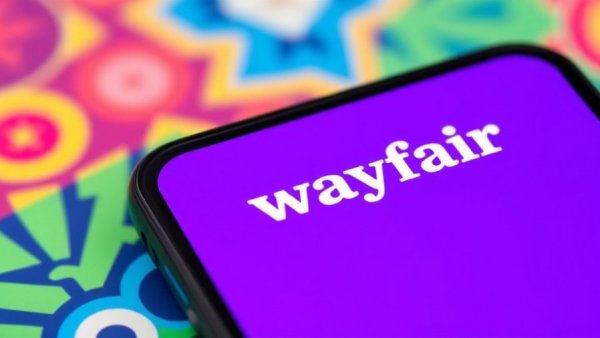 Wayfair logo on smartphone screen with vivid background.