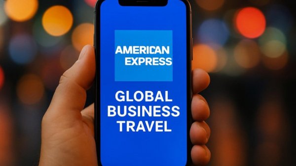 Amex GBT logo on smartphone screen in vibrant setting