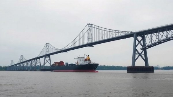 Construction of Gordie Howe Bridge with ship; Trump threatens to block it.