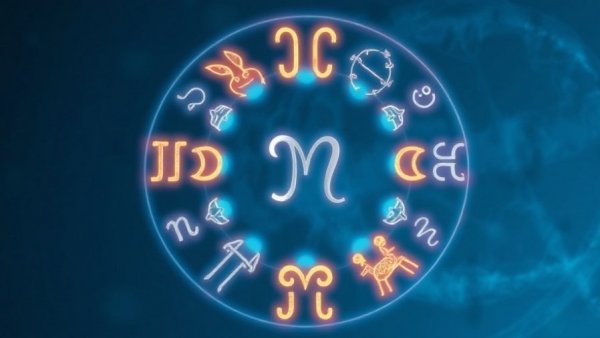 Mystical glowing zodiac symbols encircling against a blue background.