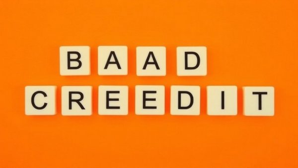 Block letters 'BAD CREDIT' on an orange background for bad credit business loans.