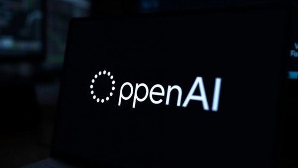 OpenAI logo on a dimly lit screen reflecting safety and lawsuit concerns.
