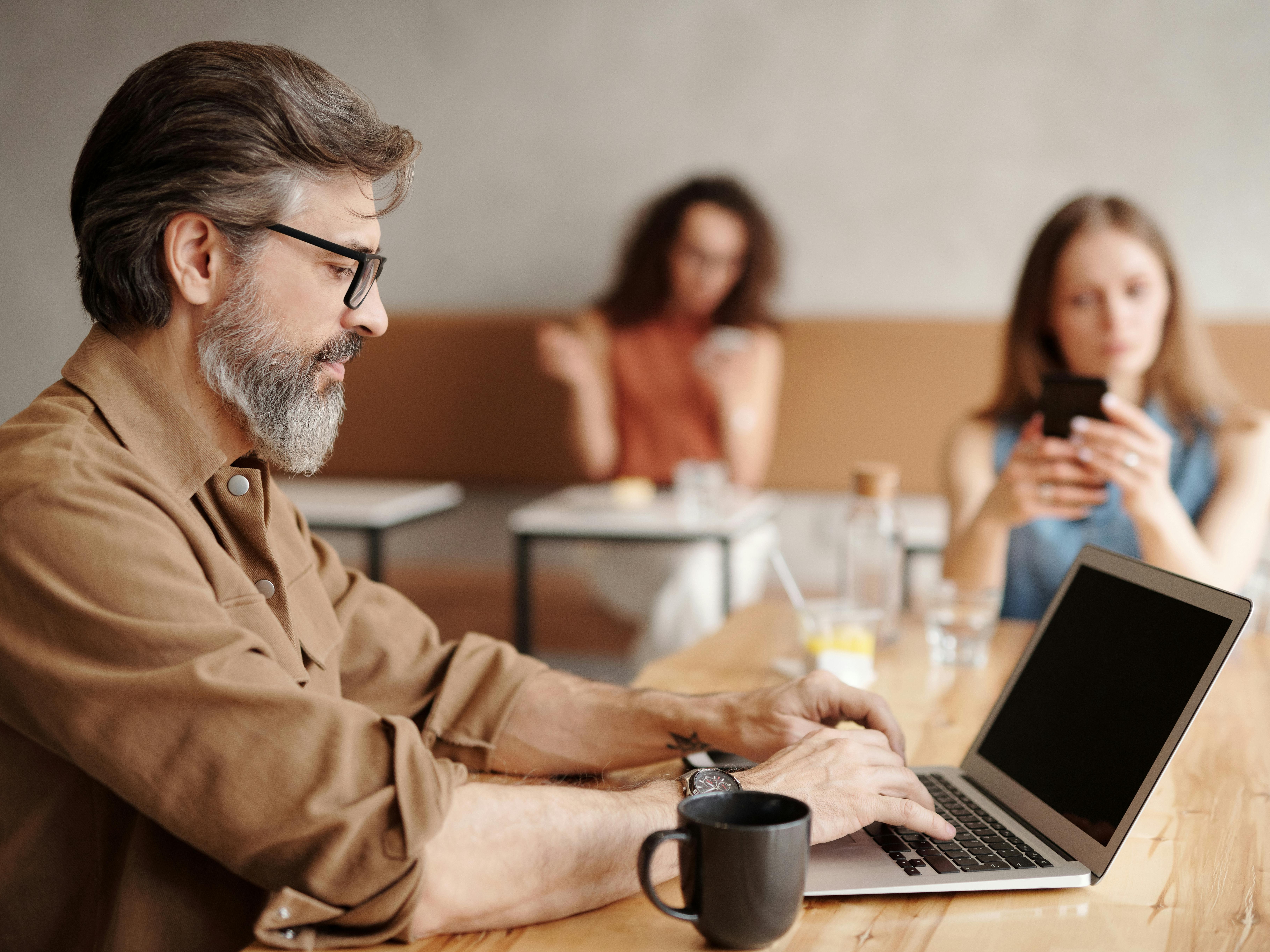 innovative creacin digital, engrossed, designing, photorealistic, in a futuristic digital workspace with holographic screens, highly detailed, artist using a digital pen tablet, cool, neon lighting accents, shot with a macro lens.