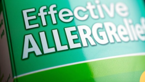 Benadryl allergy relief packaging in green filter, high detail.