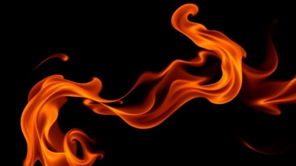 Dynamic swirling flame against black background, symbolizes signs of perimenopause.