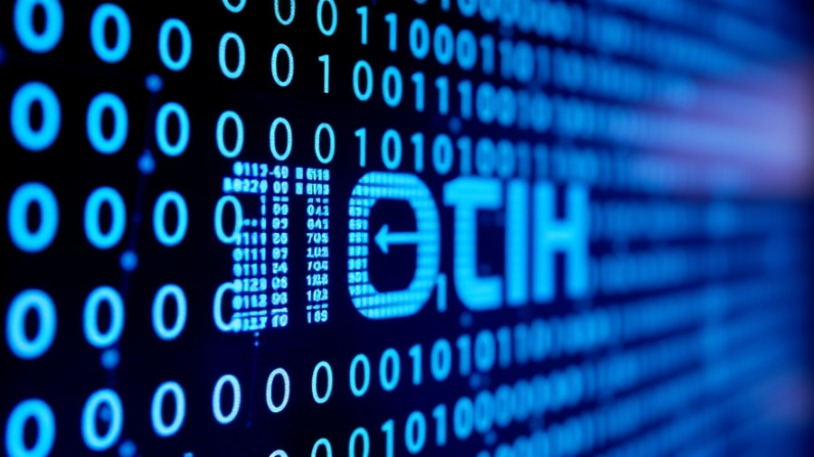 Digital display with tech logo and binary code, generative music tool.