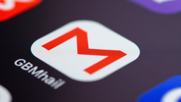 Gmail app icon on smartphone screen highlighting Gmail email misclassification.