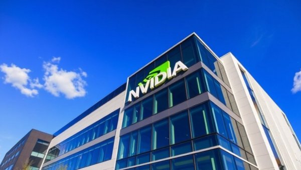 Nvidia building exterior with logo under blue sky, AI Drug Discovery.