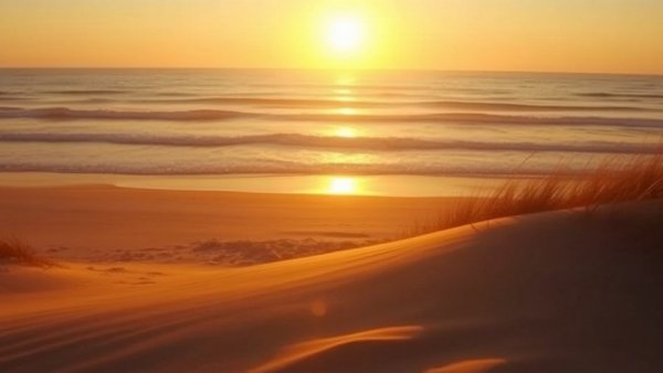 Budget activities Outer Banks: sunrise over serene beach dune.