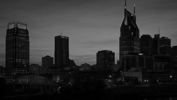 Monochrome Nashville skyline with Music City Spotlight, 2026.