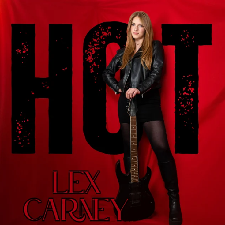 Confident woman with guitar showcasing Nashville music scene.