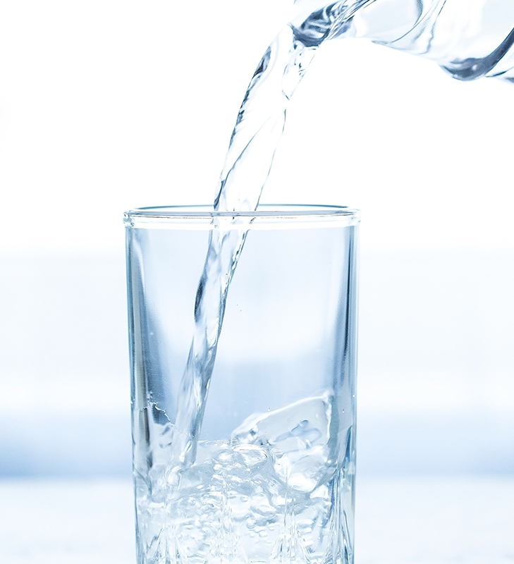 crystalline Lindyspring water, pure essence, twisting elegantly, photorealistic, rustic wooden shelf, highly detailed, pristine shine, ISO 100, f/5, crystal clear and soft teal sheen, bright ambient light, shot with a 50mm prime lens.