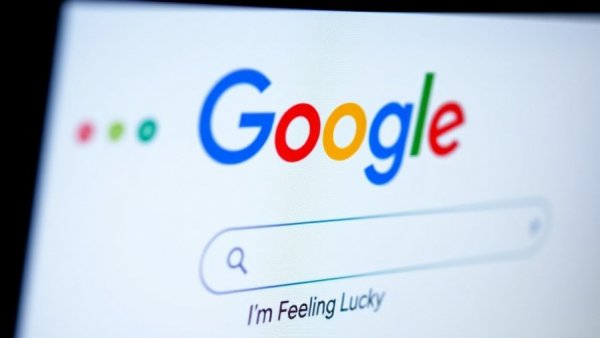 Google homepage close-up with search options.