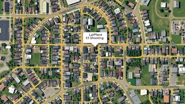 Aerial view of LaPlace neighborhood with shooting location marked, illustrating gun violence context.