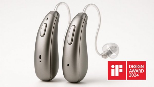 Elegant advanced hearing aids design wins award, showcasing innovation.