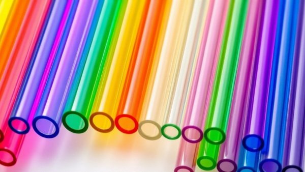 Colorful plastic tubes illustrating UV stability in outdoor products.