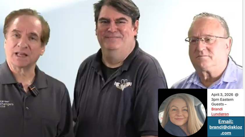 Leadership in Automotive Industry: Three men standing together indoors.