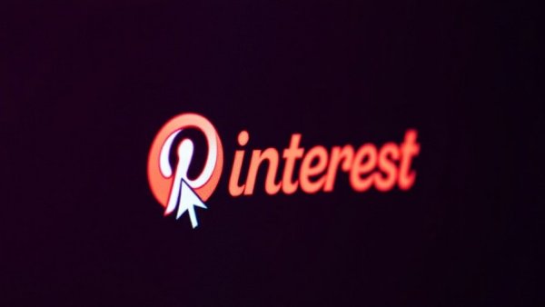 Close-up of Pinterest logo with cursor, remote work companies.