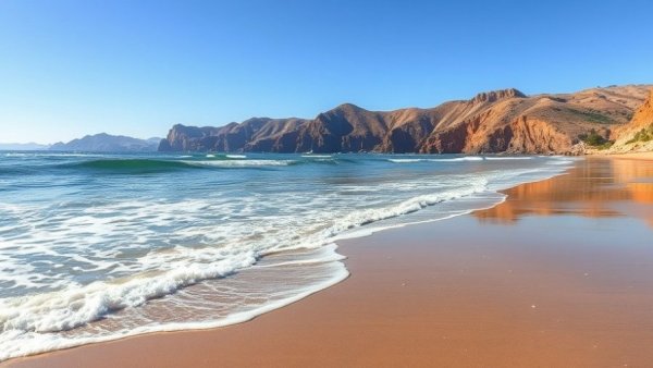 Serene Californian coastline with waves lapping the shore, California Budget Earmarks.