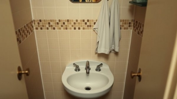 Outdated bathroom before Gatsby-inspired makeover.