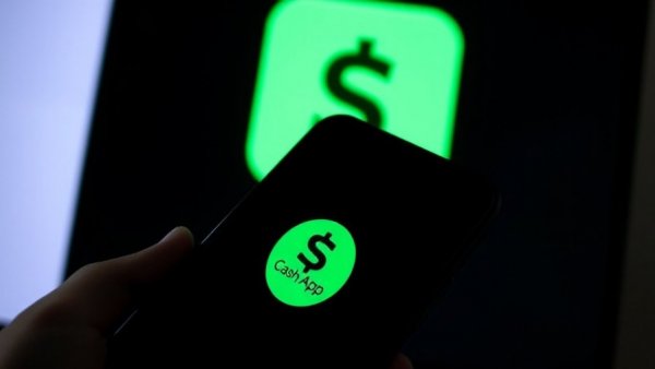 Cash App Moneybot smartphone display close-up with logo in focus.