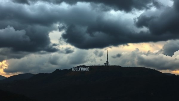 Stormy clouds over Hollywood sign, anticipating Los Angeles rain in January 2026.