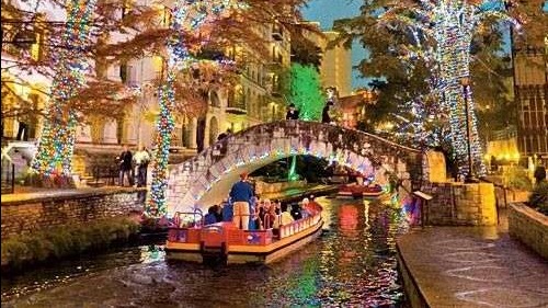 Texas towns with holiday lights festival; vibrant decorated streets.