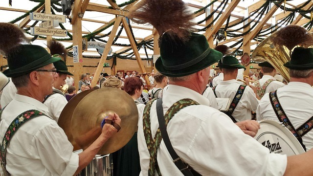 Texas Oktoberfest celebrations with beer mugs clinking.
