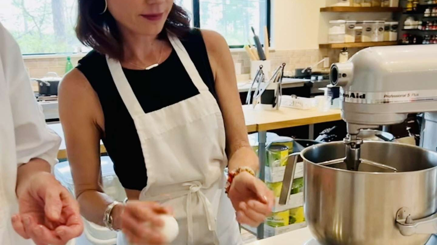 Fredericksburg family attractions: Three women enjoying time by mural.