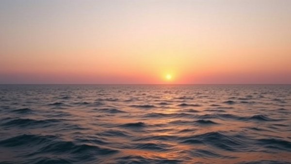 Serene ocean sunset with motivational text about small consistent actions.