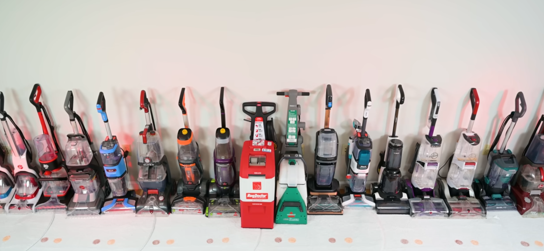 Array of top carpet cleaners displayed, 2026 models, vibrant backdrop.