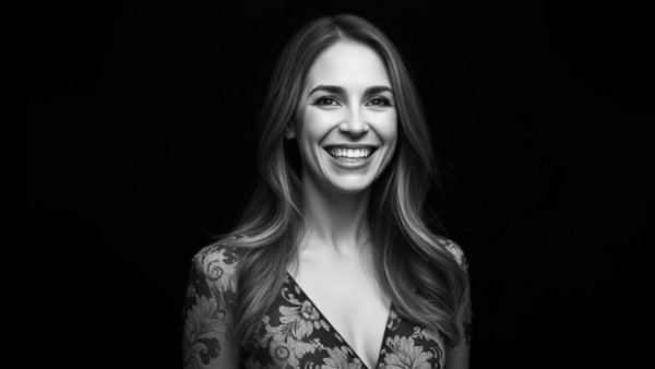 Leader of Influence Rainy Hake Austin smiling in black and white portrait.