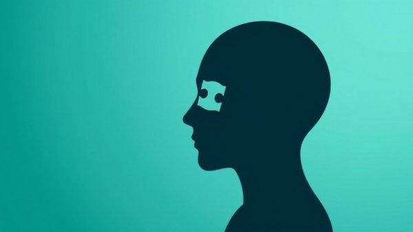 Abstract head silhouette with missing puzzle piece, ADHD symbolism.