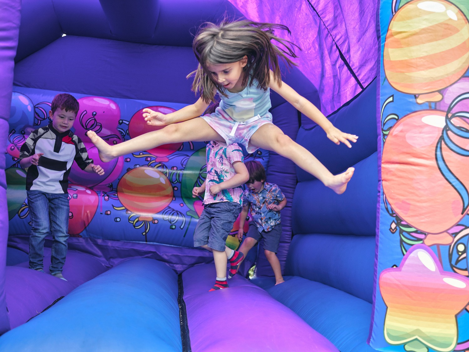 Kids having festive fun on a disco dome as party of their Essex Christmas disco hire.