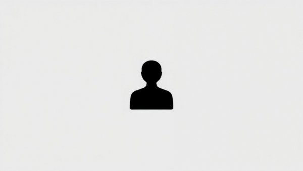 Minimalist silhouette icon representing a person.