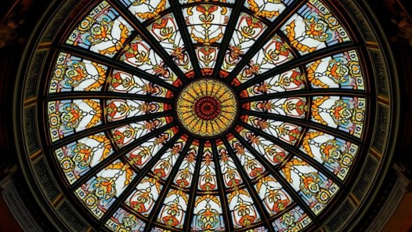 Detailed stained glass dome ceiling depicting intricate craftsmanship in Luzerne County.