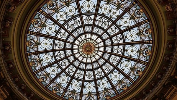 Intricate stained glass dome in Luzerne County building, art deco.