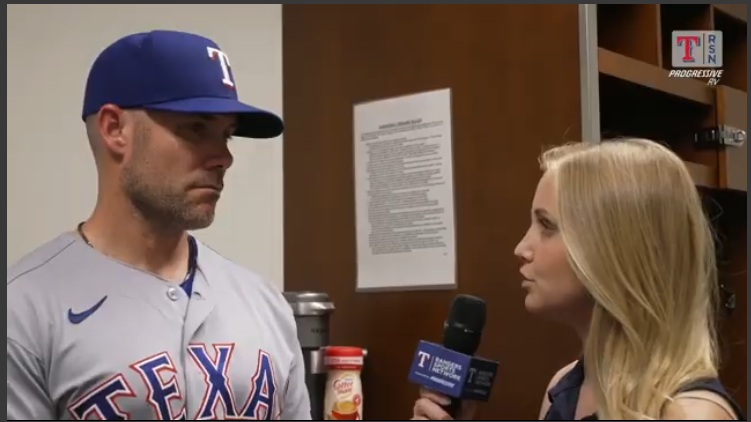 Baseball player interviewed by reporter for Skip Schumaker insights.