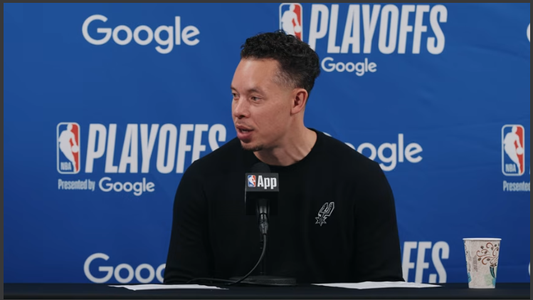 San Antonio Spurs players celebrating playoffs advancement.