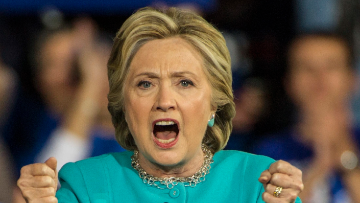 Hillary Clinton denies meeting Epstein; serious expression, close-up image
