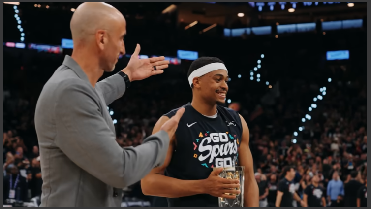 San Antonio sports news: joyful sports figures at award ceremony.